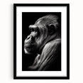 Black-framed wall art showcasing a vibrant monkey and ape gorilla design, featuring rich colors and intricate details, ideal for jungle-themed decor or animal lovers.