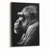 Framed canvas wall art featuring a striking black and white design of a monkey and ape, showcasing intricate details and bold lines, ideal for modern decor.