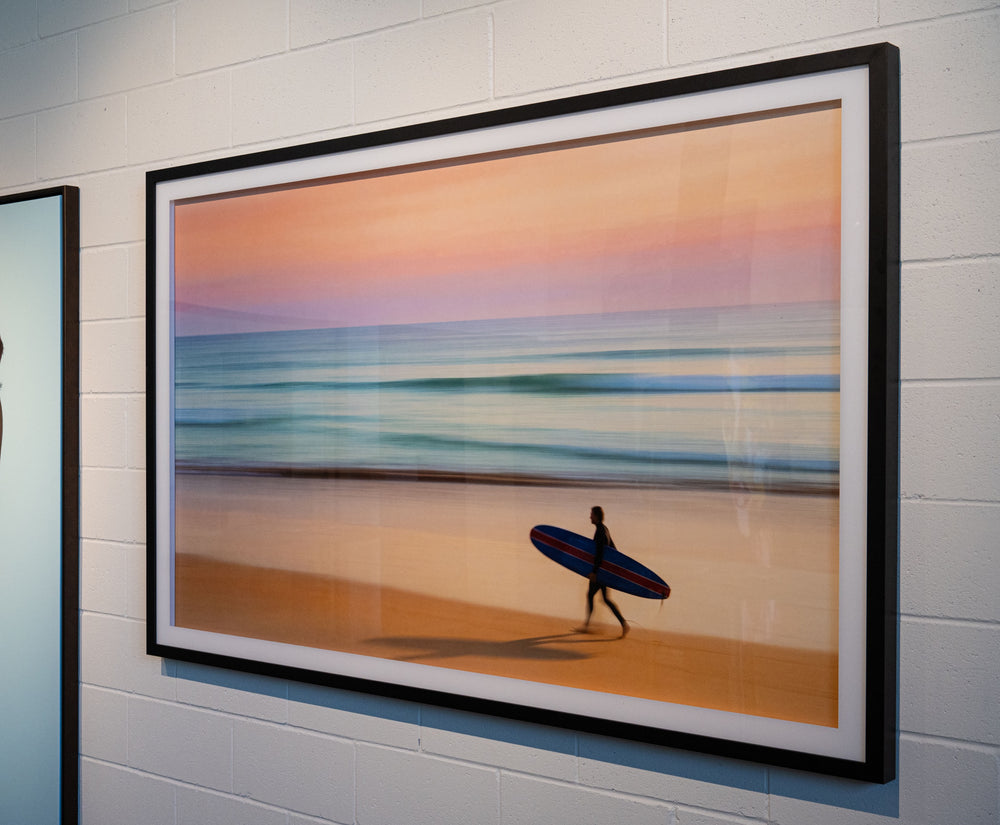 Beach print in a black frame