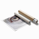 Close-up image of a bird perched on a branch, with soft green and blue background on rolled print.