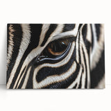 Black and white photo of a bird perched on a branch, printed on large stretched canvas.