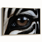 Framed canvas featuring a close-up of a bird in black and gold, ideal for bedroom wall art.