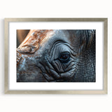 Textured art print of abstract birds in muted gray and blue tones, framed with a silver mat, suitable for bedroom decor.