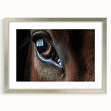 Textured art print of abstract bird design in muted earth tones, framed in silver, ideal for bedroom wall decor.