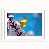 Abstract art print of a bird in muted earth tones on a white framed canvas, suitable for dining room decor.