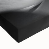 Black and white close-up floral photography on stretched canvas, suited for bedroom wall art.