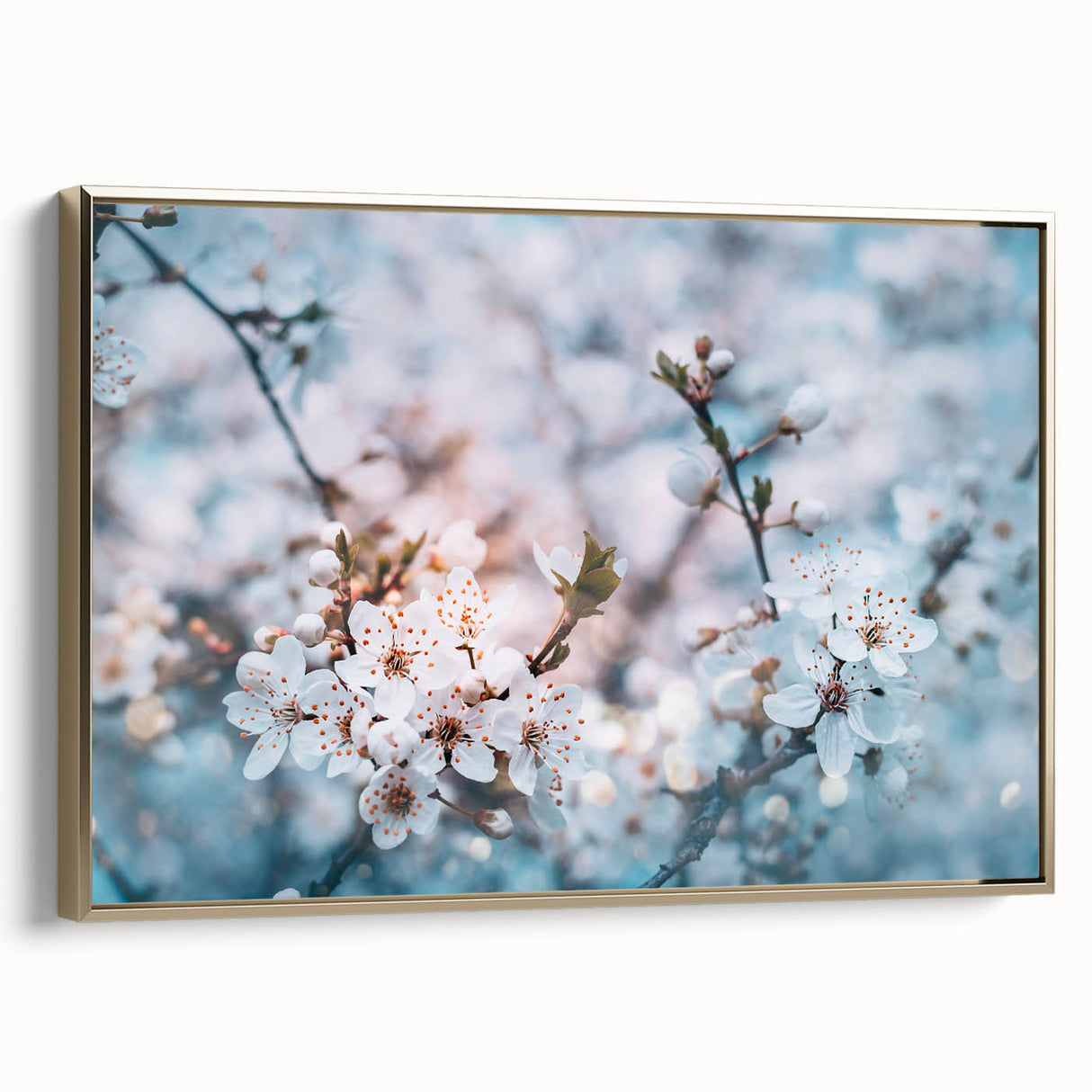Framed canvas featuring a close-up floral design in gold and black tones, suitable as wall art for a bedroom.