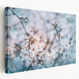 Close-up floral design on stretched canvas featuring vivid pink and green hues, suitable for kitchen wall art.