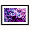 Extra large abstract art print featuring textured, colorful floral designs on a black framed canvas.