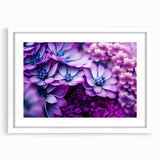 Abstract art print featuring close-up floral designs in soft pastel shades on a white framed canvas.