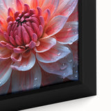 Close-up of a black framed canvas featuring a textured floral design in vibrant colors, ideal for living room decor.