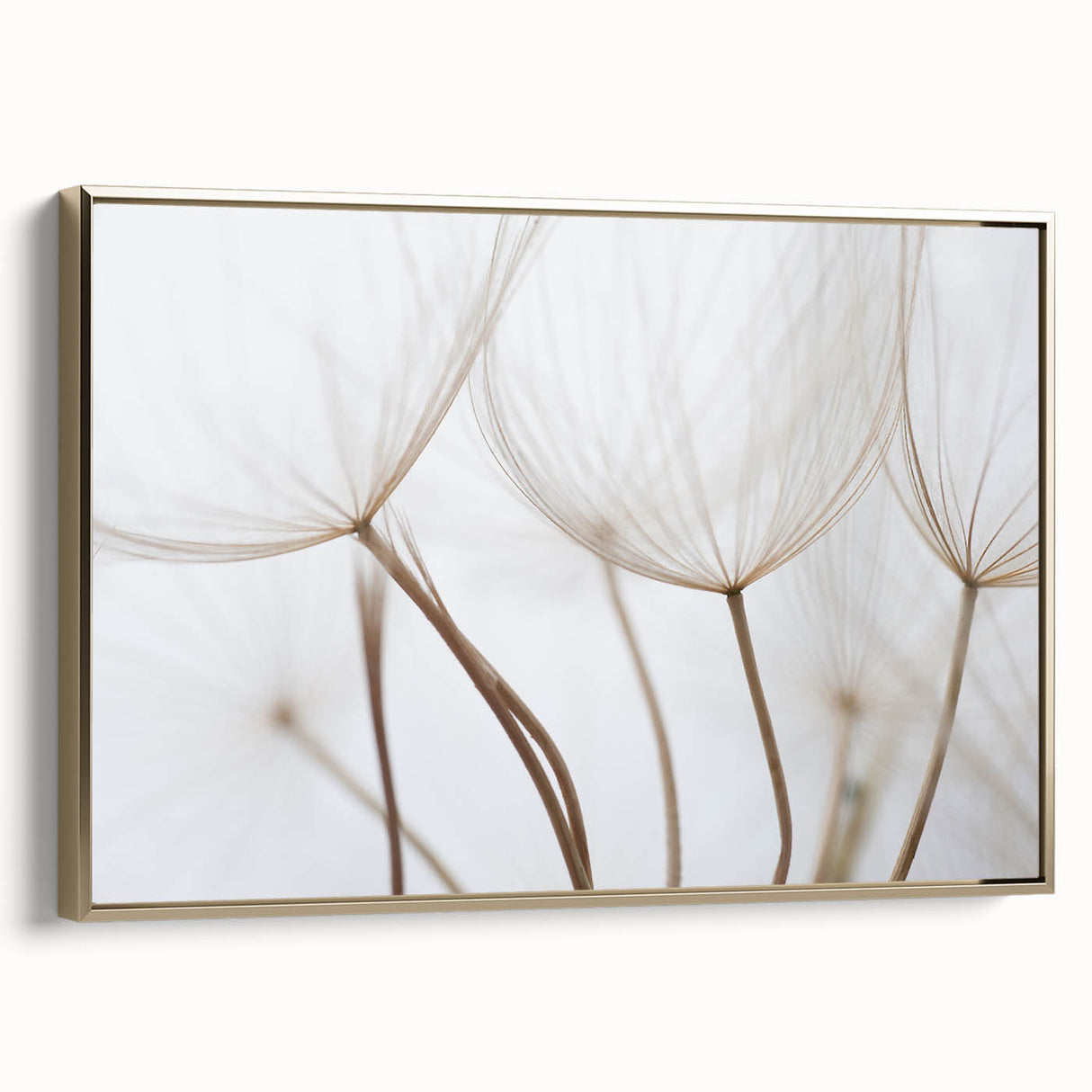 Framed canvas depicting a vintage-style floral landscape in muted gold and black tones, ideal for bedroom wall art.