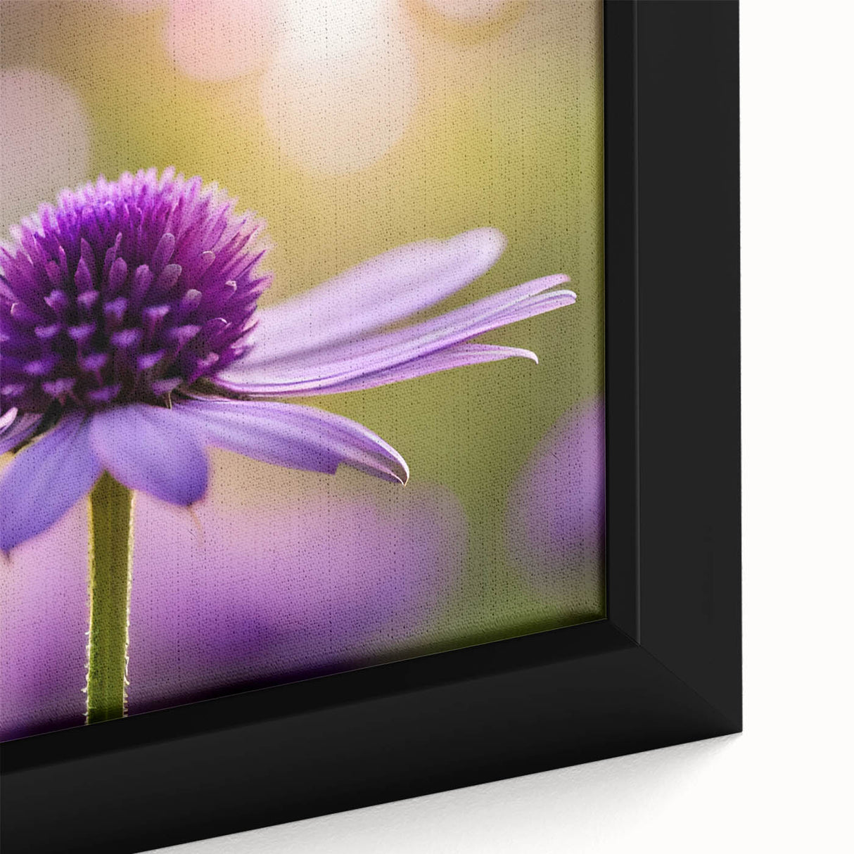 Close-up of a black framed canvas featuring a colorful, textured floral design, ideal for living room decor.