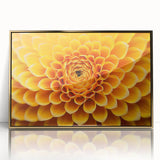 Large art print of a close-up floral design in vibrant hues, framed in gold acrylic, suitable for nursery wall decor.