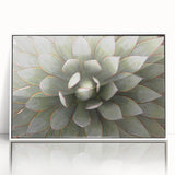 Art deco poster of stylized florals in pastel shades, framed in white acrylic, suitable for nursery wall art.