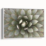 Vintage poster art featuring a close-up floral design with vibrant colors on a framed canvas, ideal for living room decor.