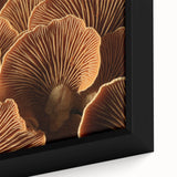 Close-up of a black framed canvas featuring a textured floral design in vibrant colors, ideal for living room decor.