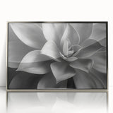 Large art print of a mid-century modernist floral design in muted pastels, framed in silver acrylic.