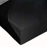 Large art of a black and white landscape painting on stretched canvas, featuring a close-up floral design.