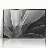 Mid-century modernist art depicting a floral design in soft pastel colors on a framed acrylic, ideal for nursery wall art.