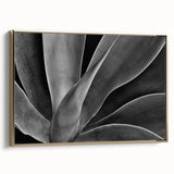 Framed canvas featuring a close-up floral design in muted gold and black tones, ideal for bedroom wall art.