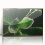 Large art print of close-up floral designs in vibrant colors, framed in gold acrylic, suitable for modern nursery decor.