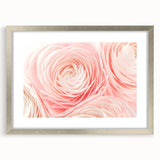 Textured art print featuring abstract florals in soft pastel shades, framed in silver, ideal for bedroom decor.