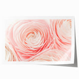 Close-up floral art on rolled canvas featuring vibrant red and pink tones, ideal for dining room or bathroom decor.