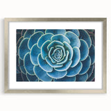 Textured art print of abstract florals in soft pastel shades, framed in silver, ideal for bedroom wall decor.