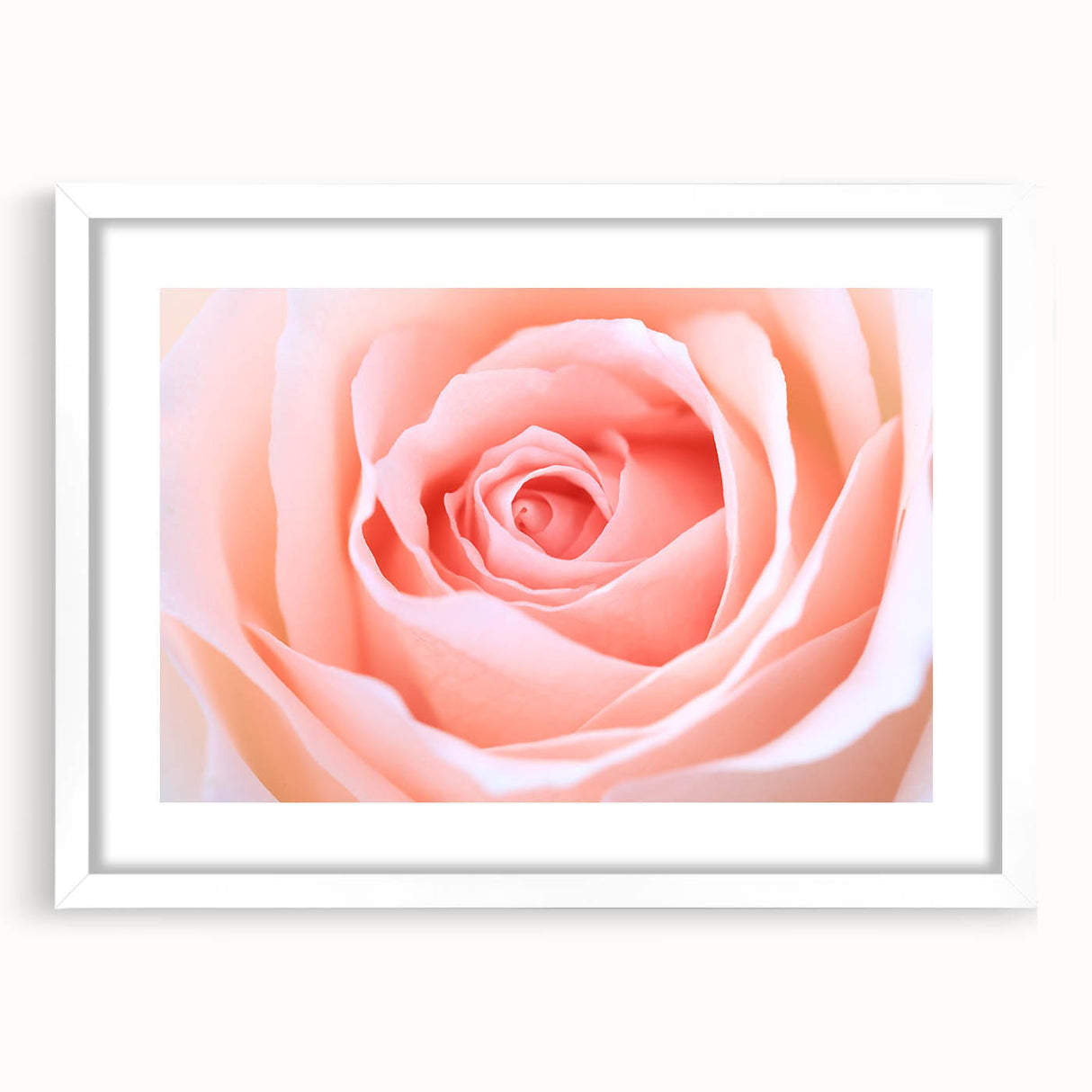Abstract art print featuring close-up floral designs in muted greens and whites, framed with a white mat.
