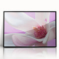 Large abstract wall art featuring vibrant floral designs in a black acrylic frame, ideal for modern living room decor.