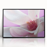 Large abstract wall art featuring vibrant floral designs in a black acrylic frame, ideal for modern living room decor.