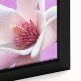 Close-up of a black framed canvas featuring a colorful, textured floral design, ideal for extra large living room wall art.