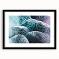 Extra large textured abstract art print featuring vibrant floral designs in a black frame, ideal for living room decor.