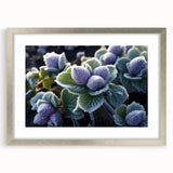 Abstract art print of a frost design in muted gray and blue tones, framed in silver, ideal for modern bedroom ambiance.