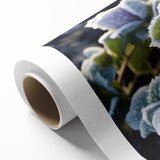 Close-up of frost patterns in muted blue and white tones on a rolled canvas, suitable as nursery wall art.