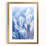 Textured art of abstract frost design in muted blue and white tones on a gold-framed mat, suitable for bedroom decor.