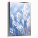 Framed canvas of a close-up landscape art painting depicting frost patterns in gold and black tones.