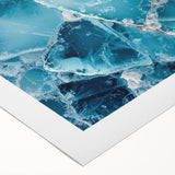 Art deco poster featuring a close-up of frost patterns in muted gray and blue tones on rolled canvas.