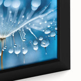 Close-up of black wall art featuring a textured frost design in colorful hues on a framed canvas.