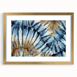 Textured art print of abstract frost design in muted blue and white tones, framed in gold, suitable for bedroom decor.