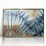Mid-century modernist art depicting frost patterns in muted blue and white tones on a gold-framed acrylic.
