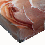 Close-up landscape art painting of frost patterns on ice in black and white on stretched canvas.