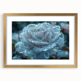 Textured art depiction of frost patterns in muted white and blue tones on a gold-framed canvas.