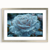 Abstract art print of a frost-like design in muted gray and white tones, framed in silver.