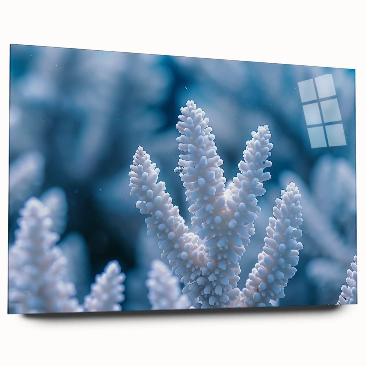 Close-up of frost design in cool blue and white tones on acrylic glass, suitable for bedroom or dining room art.