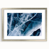 Abstract art print featuring close-up of frost patterns in silver frame, ideal for dining room or bedroom wall decor.