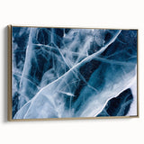 Framed canvas depicting a close-up of frost patterns in muted gray and white tones.