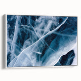 Framed canvas featuring a close-up of frost patterns in muted gray and white tones, ideal for bedroom wall art.