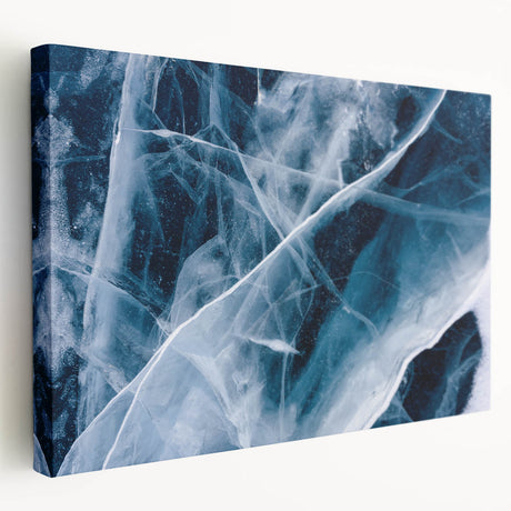 Close-up of frost patterns on a stretched canvas, featuring muted blue and white tones, suitable for kitchen wall art.